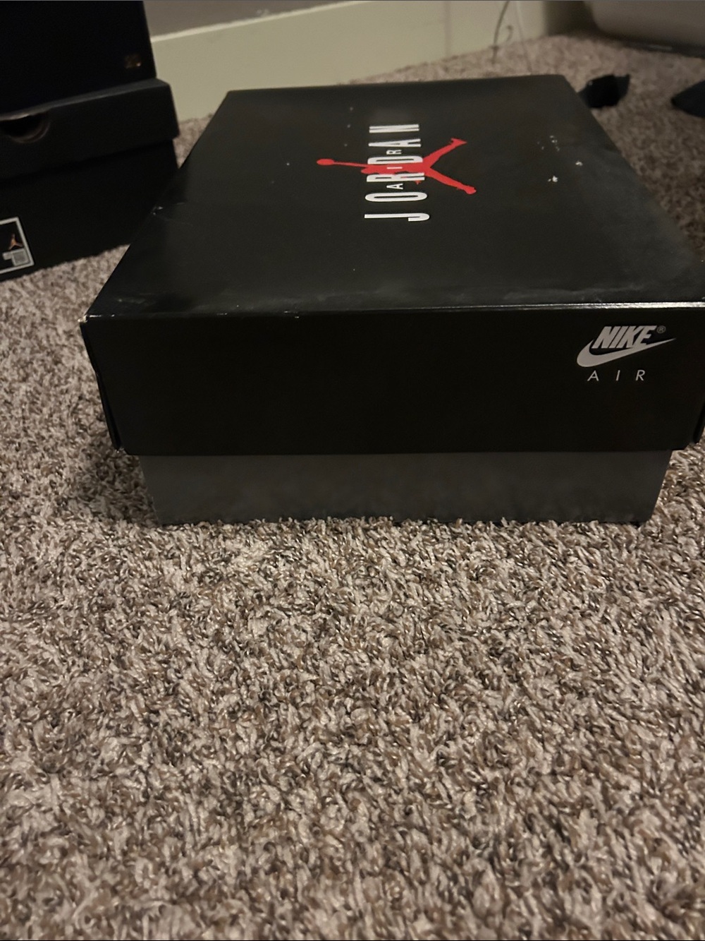 empty Nike Black and Red Jordan Shoe Box with Gray Base